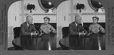 38554 President Dwight D. Eisenhower with Oveta Culp Hobby, Secretary of Health Education and Welfare.